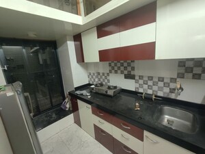 Kitchen in 1 RK Apartment at Om CHS Kandivali, Kandivali West – for Rent