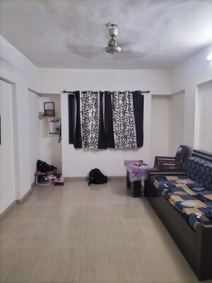 Living Room in 2 BHK Apartment at Wadgaon Sheri – for Rent