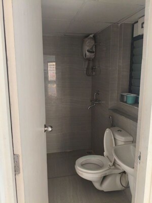 Bathroom in 2 BHK Apartment at Runwal Gardens Phase I, Dombivli East – for Rent