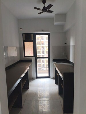 Kitchen in 2 BHK Apartment at Runwal Gardens Phase I, Dombivli East – for Rent