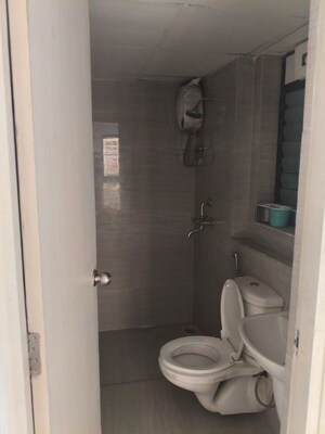 Bathroom in 2 BHK Apartment at Runwal Gardens Phase I, Dombivli East – for Rent
