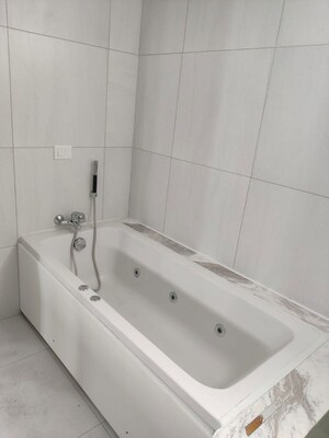 Bathroom in 4 BHK Apartment at Tata Primanti-Tower Residences, Sector 72 – for Sale