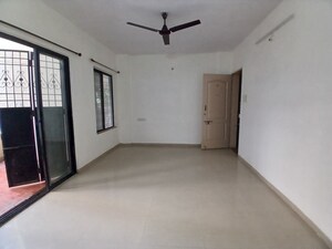 Room in 2 BHK Apartment at Atharva Garden, Kharadi – for Rent