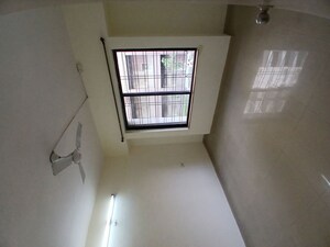 Room in 2 BHK Apartment at Atharva Garden, Kharadi – for Rent