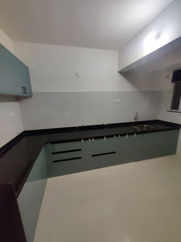 Kitchen, kshitej-24-life-blooms 2 Bedroom 800 Sq.Ft. Apartment In Tathawade Pune 10191054