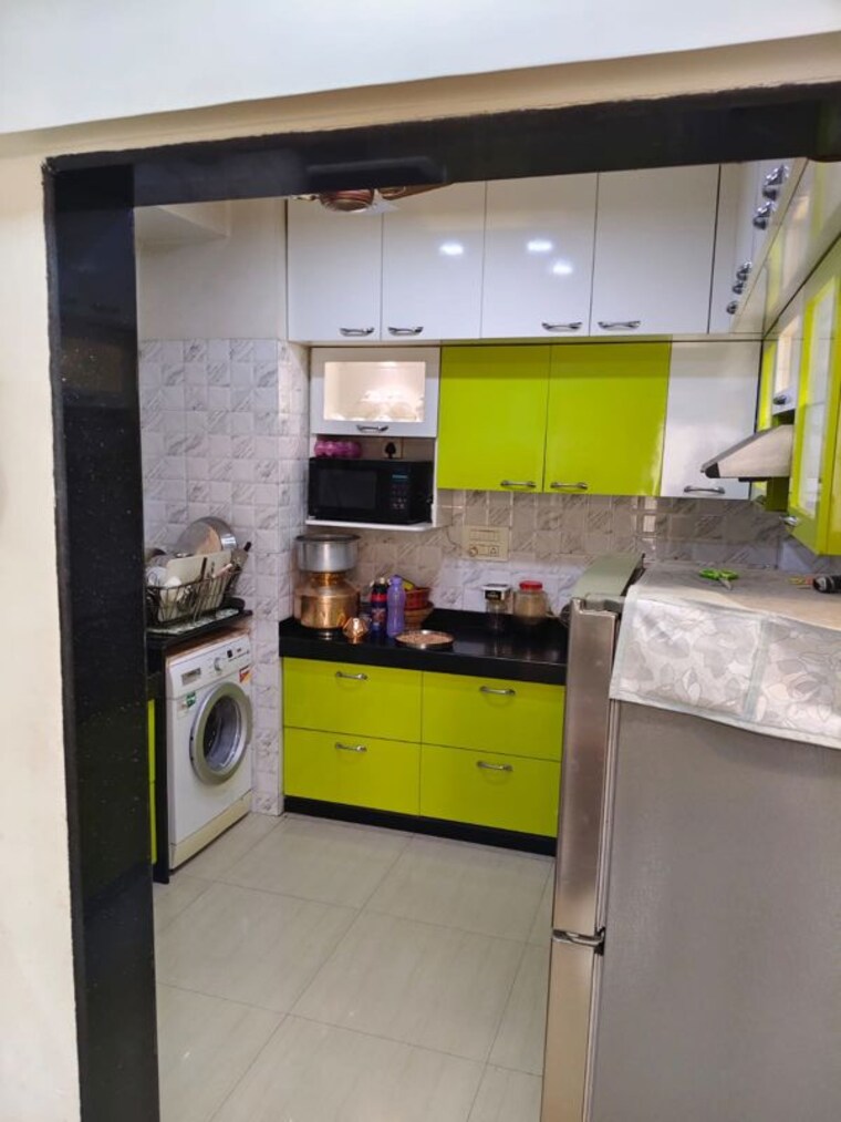 Kitchen, unnathi-woods-phase-1-and-2 2 Bedroom 650 Sq.Ft. Apartment In Ghodbunder Road Thane 10191064