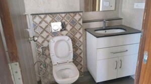 Bathroom in 5 BHK Apartment at Millenium Bajrang Society, Sector 43 – for Sale