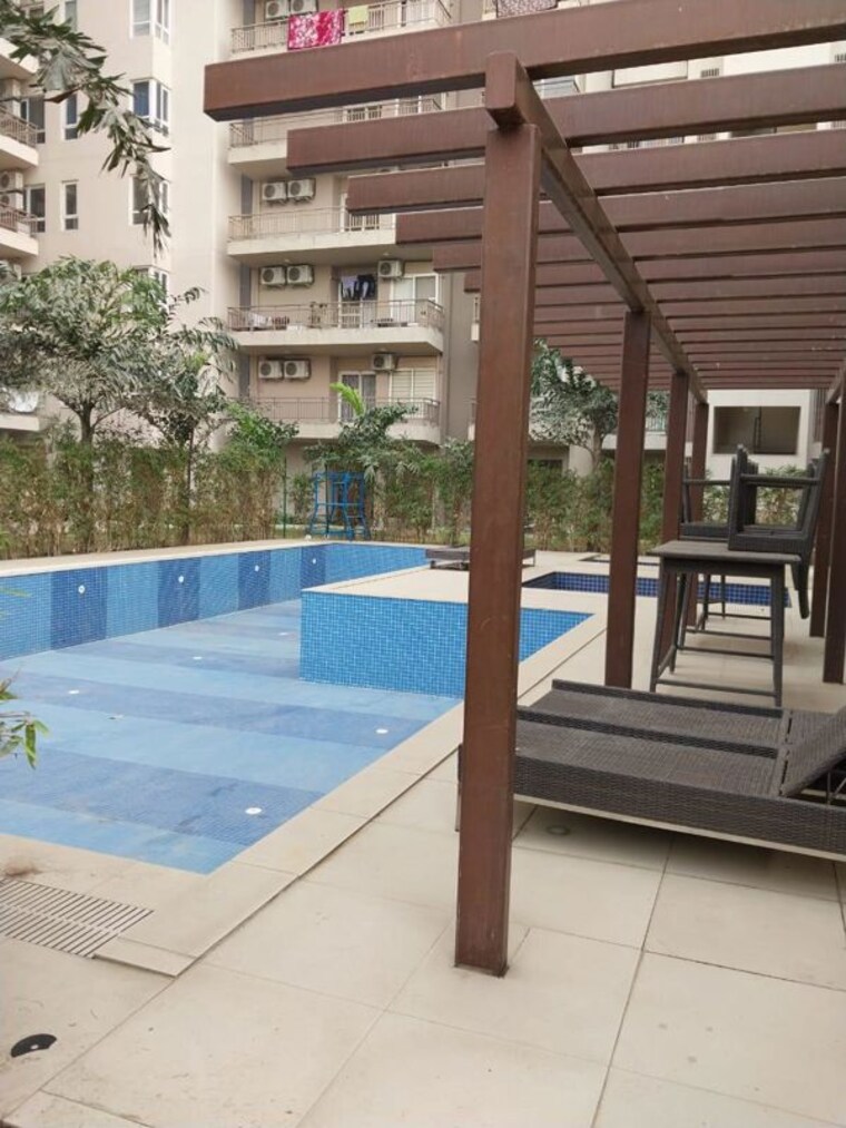 Swimming Pool, adani-m2k-oyster-grande 3.5 Bedroom 1899 Sq.Ft. Apartment In Sector 102 Gurgaon 10191239