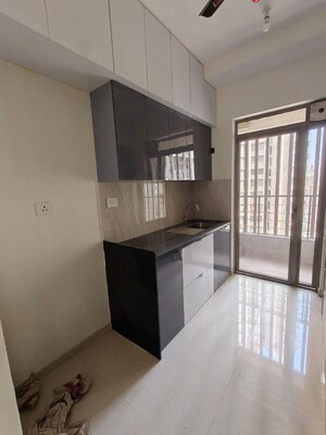 Kitchen in 2 BHK Apartment at Kalpataru Paramount, Kapur Bawdi – for Rent