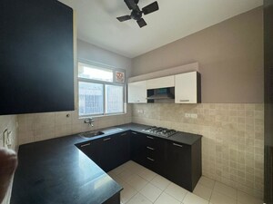 Kitchen in 3 BHK Builder Floor at Ansal Esencia-Mulberry Homes, Sector 67 – for Rent