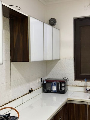 Kitchen in 2 BHK Apartment at Shree Vardhman Green Court, Sector 90 – for Rent