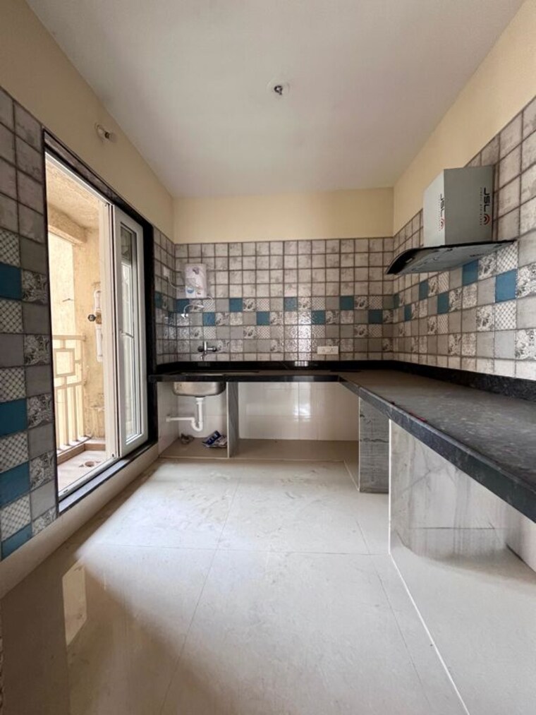 Kitchen, paradise-sai-world-city-phase-2 2 Bedroom 1200 Sq.Ft. Apartment In New Panvel Navi Mumbai 10191479