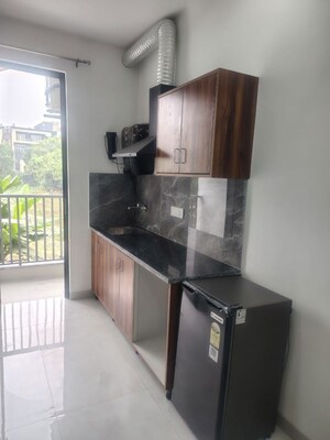 Kitchen in 1 BHK Apartment at Shree Vardhman Green Court, Sector 90 – for Rent