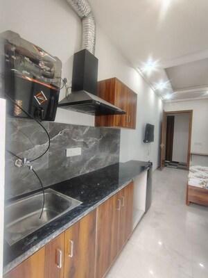 Kitchen in 1 BHK Apartment at Shree Vardhman Green Court, Sector 90 – for Rent