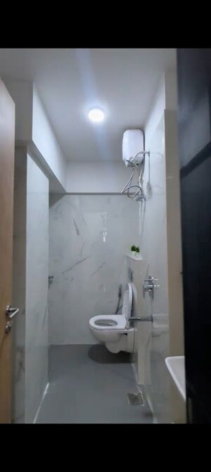 Bathroom in 2 BHK Apartment at Amrut Smruti CHS, Andheri West – for Rent