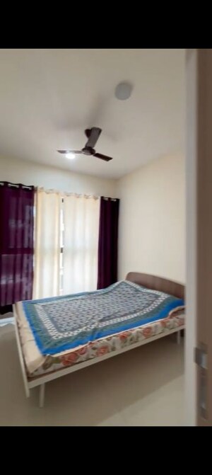 Bedroom in 2 BHK Apartment at Amrut Smruti CHS, Andheri West – for Rent