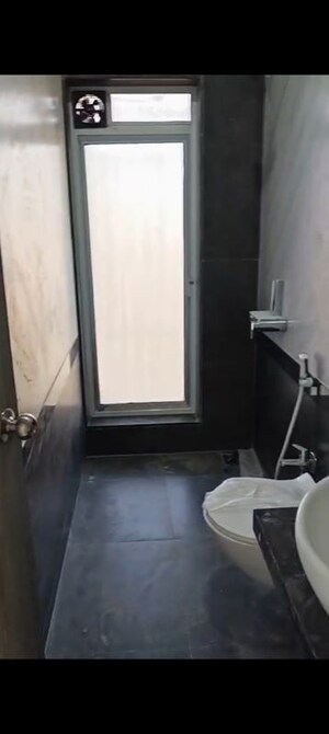 Bathroom in 3 BHK Apartment at Alag Marina, Mulund West – for Rent