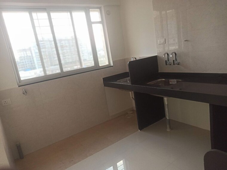Kitchen, millennium-atlas 2 Bedroom 1100 Sq.Ft. Apartment In Tathawade Pune 10191732