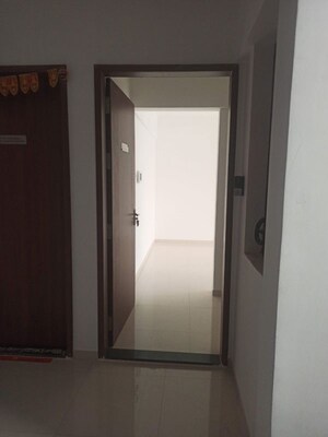 Building Lobby in 2 BHK Apartment at Millennium Atlas, Tathawade – for Rent