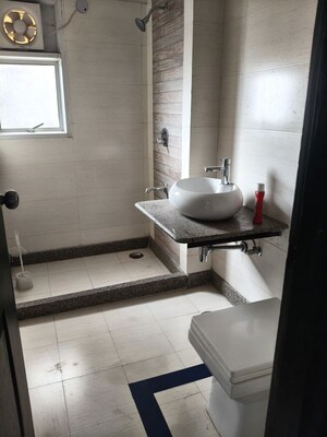 Bathroom in 3 BHK Apartment at Aditya Celebrity Homes, Sector 76 – for Rent