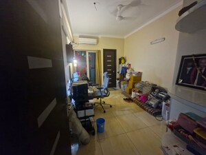 Living Room in 2 BHK Apartment at Mahagun Moderne, Sector 78 – for Rent