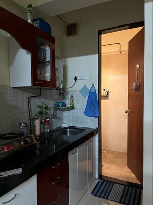 Kitchen in 1 BHK Apartment at Bhoomi Acres, Thane West – for Rent