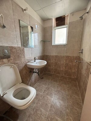 Bathroom in 2 BHK Apartment at Sam Palm Olympia, Sector 16c Greater Noida – for Sale