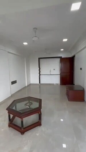 Living Room in 2 BHK Apartment at Sanjeev Enclave, Andheri West – for Rent
