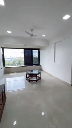 Living Room in 2 BHK Apartment at Sanjeev Enclave, Andheri West – for Rent