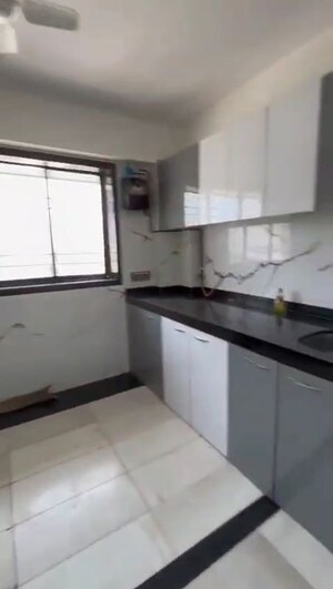 Kitchen in 2 BHK Apartment at Sanjeev Enclave, Andheri West – for Rent