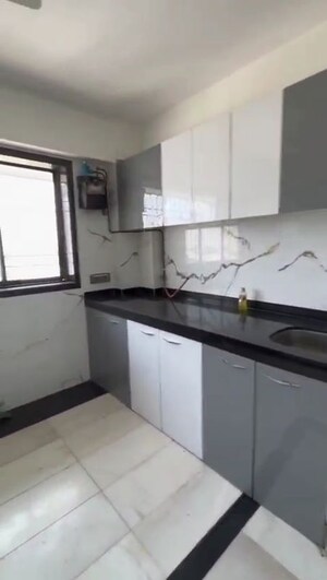 Kitchen in 2 BHK Apartment at Sanjeev Enclave, Andheri West – for Rent