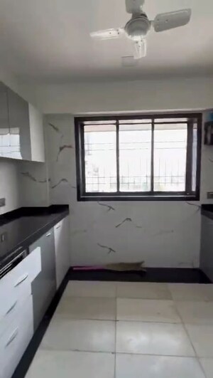 Kitchen in 2 BHK Apartment at Sanjeev Enclave, Andheri West – for Rent
