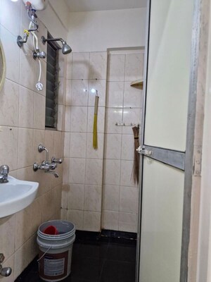 Bathroom in 2 BHK Apartment at Valentine Apartments, Goregaon East – for Rent