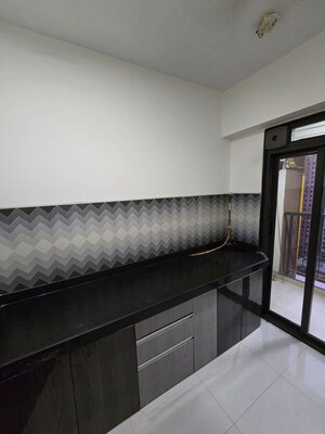 Kitchen in 2 BHK Apartment at Lodha Splendora River View, Ghodbunder Road – for Rent