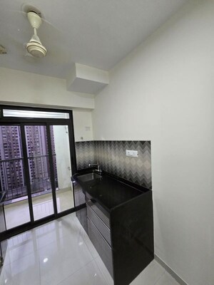 Kitchen in 2 BHK Apartment at Lodha Splendora River View, Ghodbunder Road – for Rent