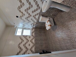 Bathroom in 4 BHK Apartment at Sadupura Village – for Sale