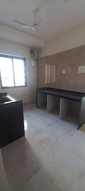 Kitchen in 2 BHK Apartment at Gio Vindhyagiri CHS, Goregaon East – for Rent