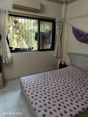 Bedroom in 3 BHK Apartment at Swapna Kiran CHS, Malad East – for Sale