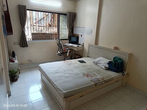 Bedroom in 3 BHK Apartment at Swapna Kiran CHS, Malad East – for Sale