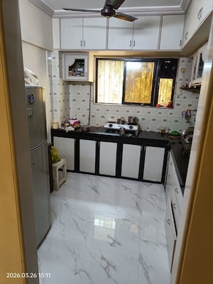 Kitchen in 3 BHK Apartment at Swapna Kiran CHS, Malad East – for Sale