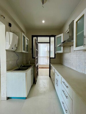 Kitchen in 2 BHK Apartment at Golden Sand Apartments, Dhakoli – for Rent