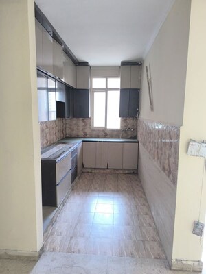 Kitchen in 3 BHK Apartment at Amrapali Golf Homes, Sector 4 Greater Noida – for Rent