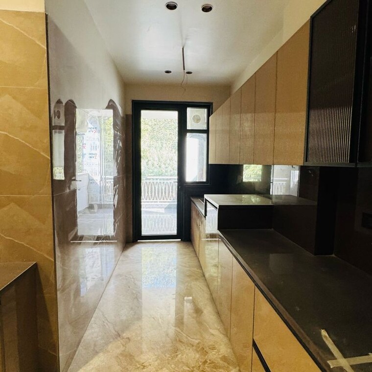 Kitchen, orchid-mayfield-gardens 3 Bedroom 633 Sq.Yd. Builder Floor In Sector 89 Gurgaon 10193324
