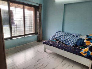 Bedroom in 2 BHK Apartment at Royal Palms Garden View, Goregaon East – for Sale