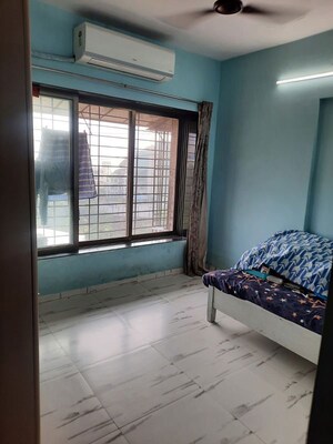 Room in 2 BHK Apartment at Royal Palms Garden View, Goregaon East – for Sale