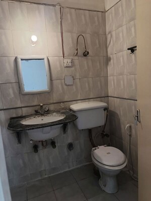 Bathroom in 2 BHK Apartment at Windsor and Nova Society, Ahinsa Khand 2 – for Rent