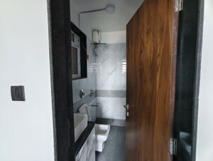 Bathroom in 1 BHK Apartment at Vaibhavlaxmi Peak 25, Vikhroli East – for Rent