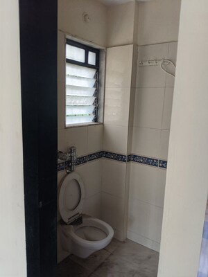 Bathroom in 2 BHK Apartment at Lok Raunak Phase II, Andheri East – for Sale