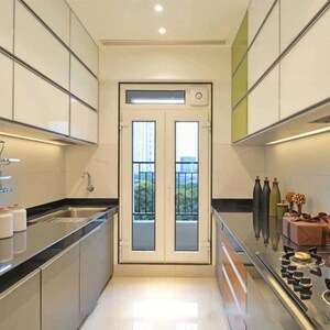 Kitchen in 3 BHK Apartment at Rustomjee Azziano Wing D, Thane West – for Rent