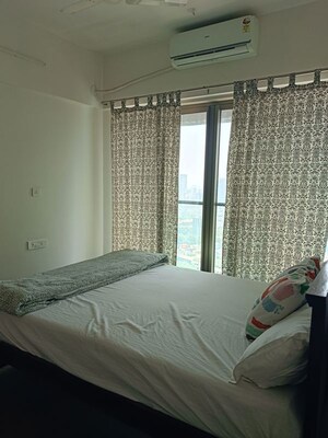 Bedroom in 2 BHK Apartment at Chandak Cornerstone, Worli – for Rent